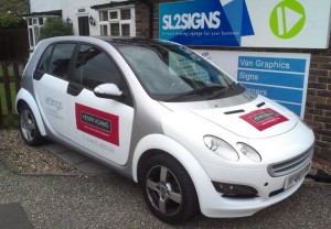 White car outside office