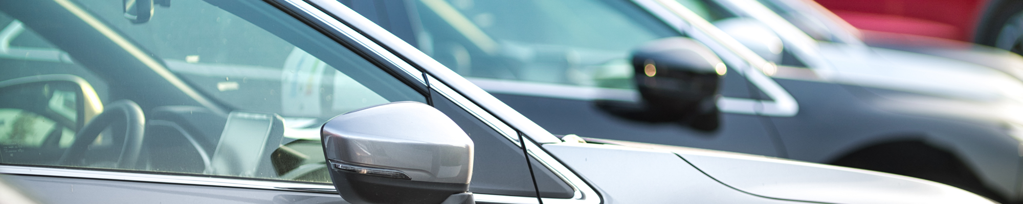 Outdoor Wall Mounted Sign (2000 x 400 px) (5) banner featuring a line up of cars